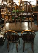 A set of four stick back chairs with matching drawer leaf table.