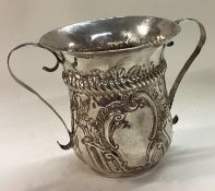A Georgian silver fluted two handled cup.