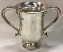 An Art Deco silver loving cup.