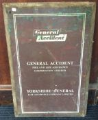 A large bronze "General Accident" sign.