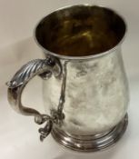 A large 18th Century Georgian silver mug.