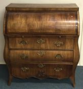 A large Continental three drawer cylinder top maho
