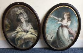 A pair of oval wooden framed and glazed pastel portraits.