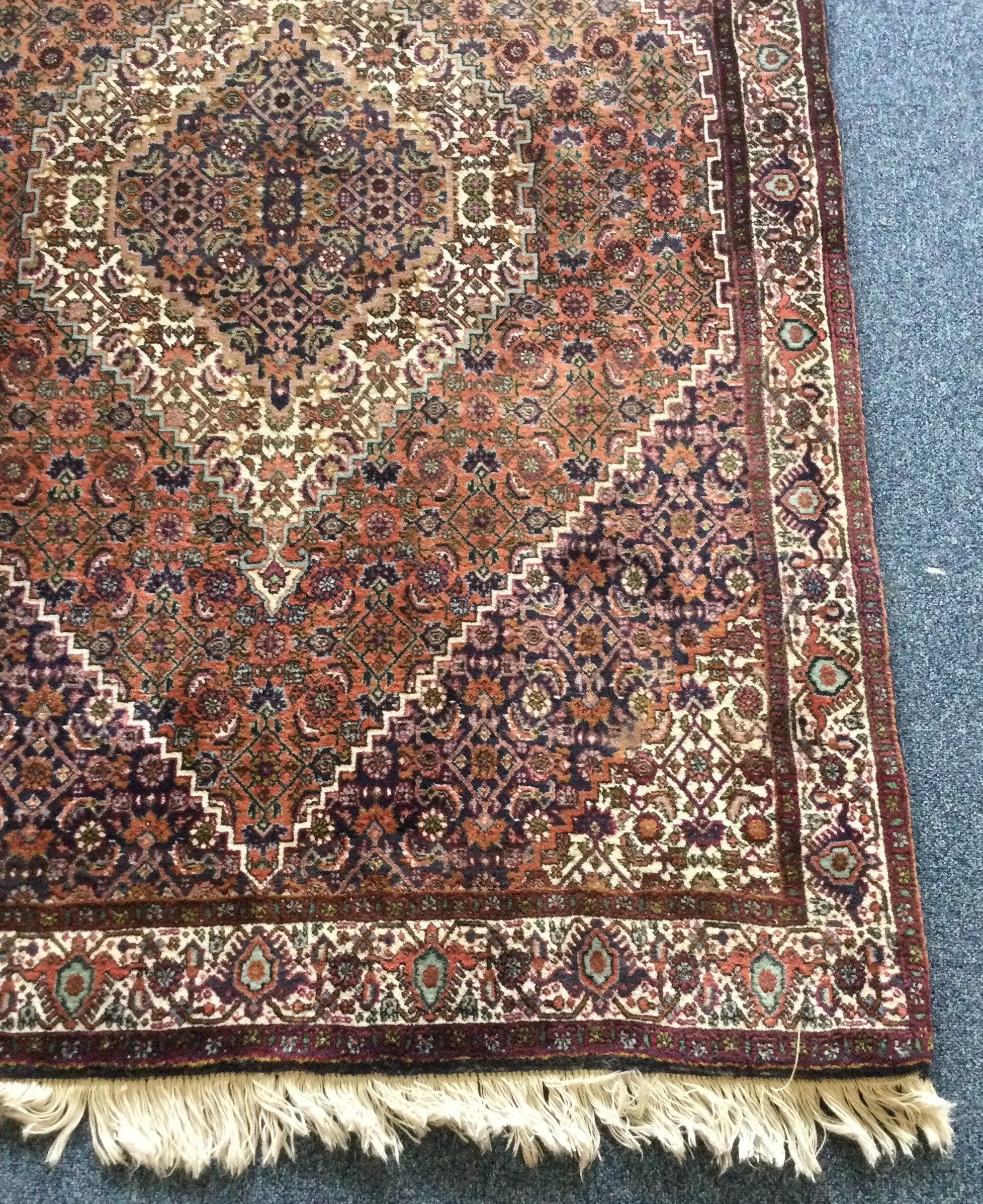 A good quality small rug decorated in bright colours. - Image 2 of 2