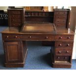 A Victorian mahogany twin pedestal desk with slope top.