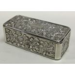 A William IV silver snuff box embossed with thistles and flowers. London 1833.