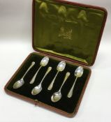 A set of six cased silver spoons. Retailed in Leeds. Sheffield 1916.
