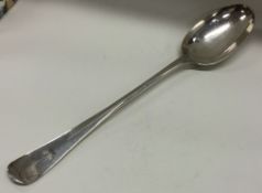 A large silver plated rat tail crested basting spoon.