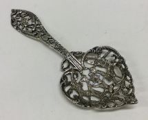 A novelty Victorian silver pierced dessert spoon.