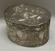 A Continental silver chased hinged snuff box. Marked to base.