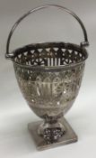 A 1930’s silver pierced swing handled pail. Sheffield. By Henry Aitken.