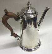 A fine 18th Century silver coffee pot. London 1777. Marked to base. By Richard Bayley.