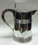 A silver quart tankard and jug with later added spout. London 1780. LAO hallmarked.