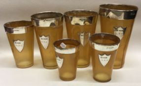 A set of six silver and horn beakers. Sheffield 1928. By Mappin Brothers.