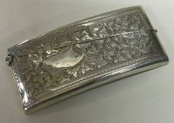 A silver engraved vesta case. Birmingham 1904.