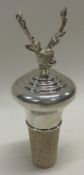 An unusual cast silver bottle stopper mounted with a stag.