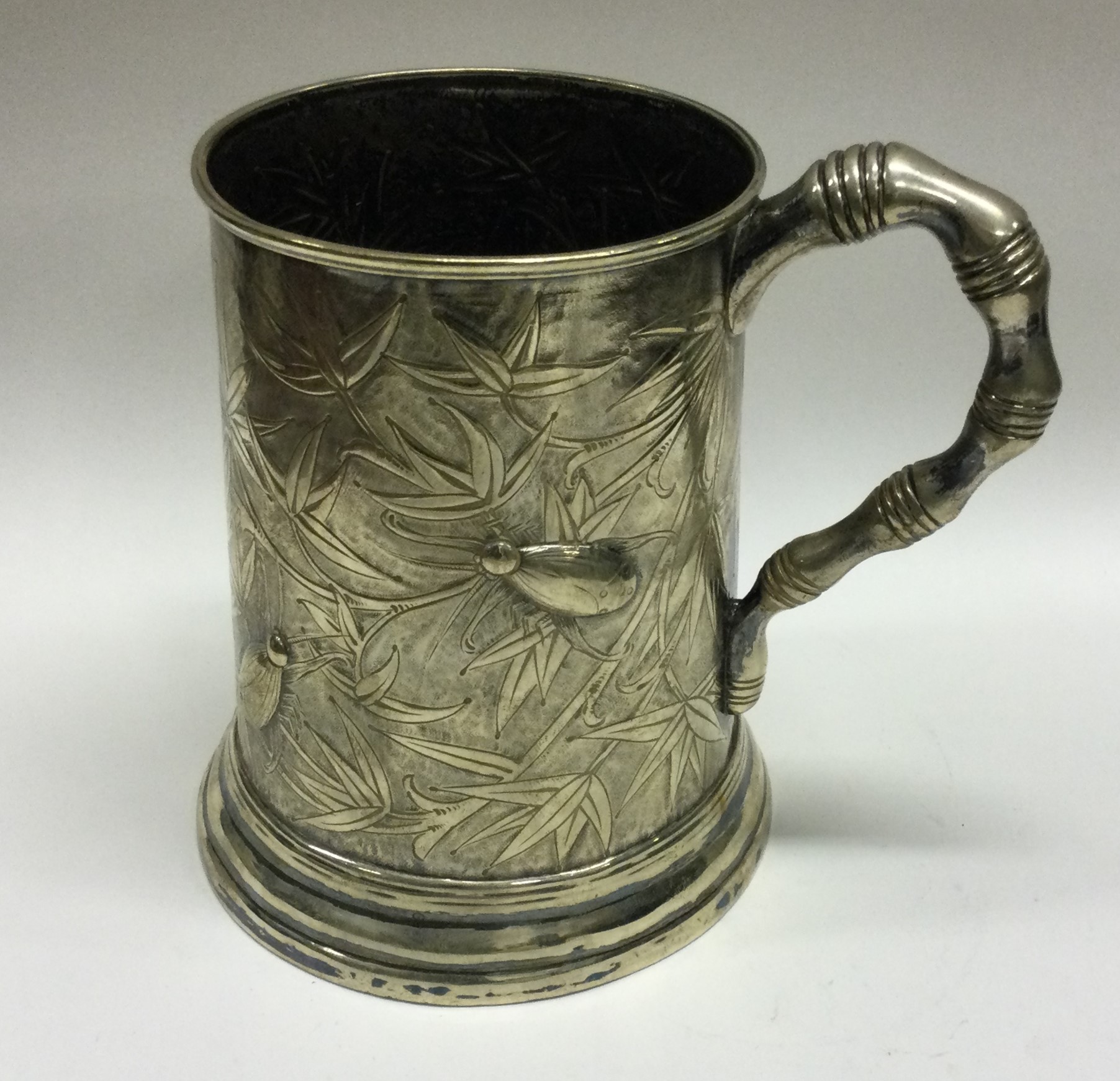 A heavy Chinese silver plated mug embossed with beetles. - Image 2 of 2