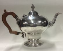 A William IV silver bullet teapot with coat of arms to centre. London 1830.