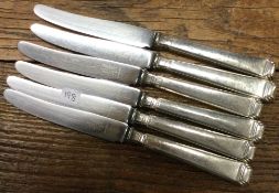 A set of six silver mounted tea knives. By Mappin & Webb.