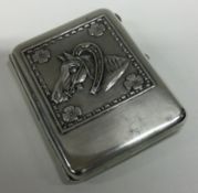 An early 20th Century silver and gold mounted cigarette case.