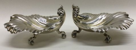 A pair of William IV silver shell shaped salts. London 1834. By John & George Angel.