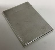 A Victorian silver card case with engine turned decoration. Birmingham 1860. By B&F.