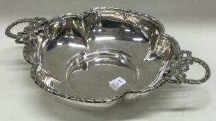 A decorative silver bowl with pierced swag decoration. Sheffield 1908.