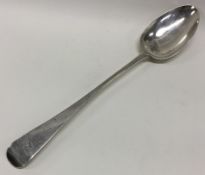 A large Victorian silver crested basting spoon. London 1840. By George Adams.