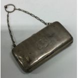 A silver purse with engine turned decoration. Birmingham 1914.