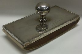 A large silver desk blotter. Birmingham 1912. By Elkington & Co.