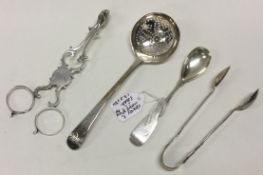 An Irish silver mustard spoon along with a George III silver sifter spoon etc.