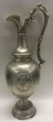 OF ECCLESIASTICAL INTEREST: A large Victorian silver wine jug depicting King David.