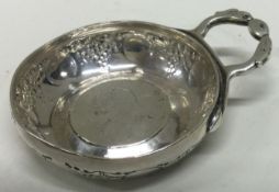 A heavy 18th Century French silver wine taster with King to centre.