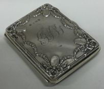 A novelty hinged silver card case with swag decoration. Birmingham 1906.