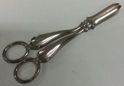 A pair of silver grape scissors. Sheffield 1935. By Charles Bradbury & Sons.