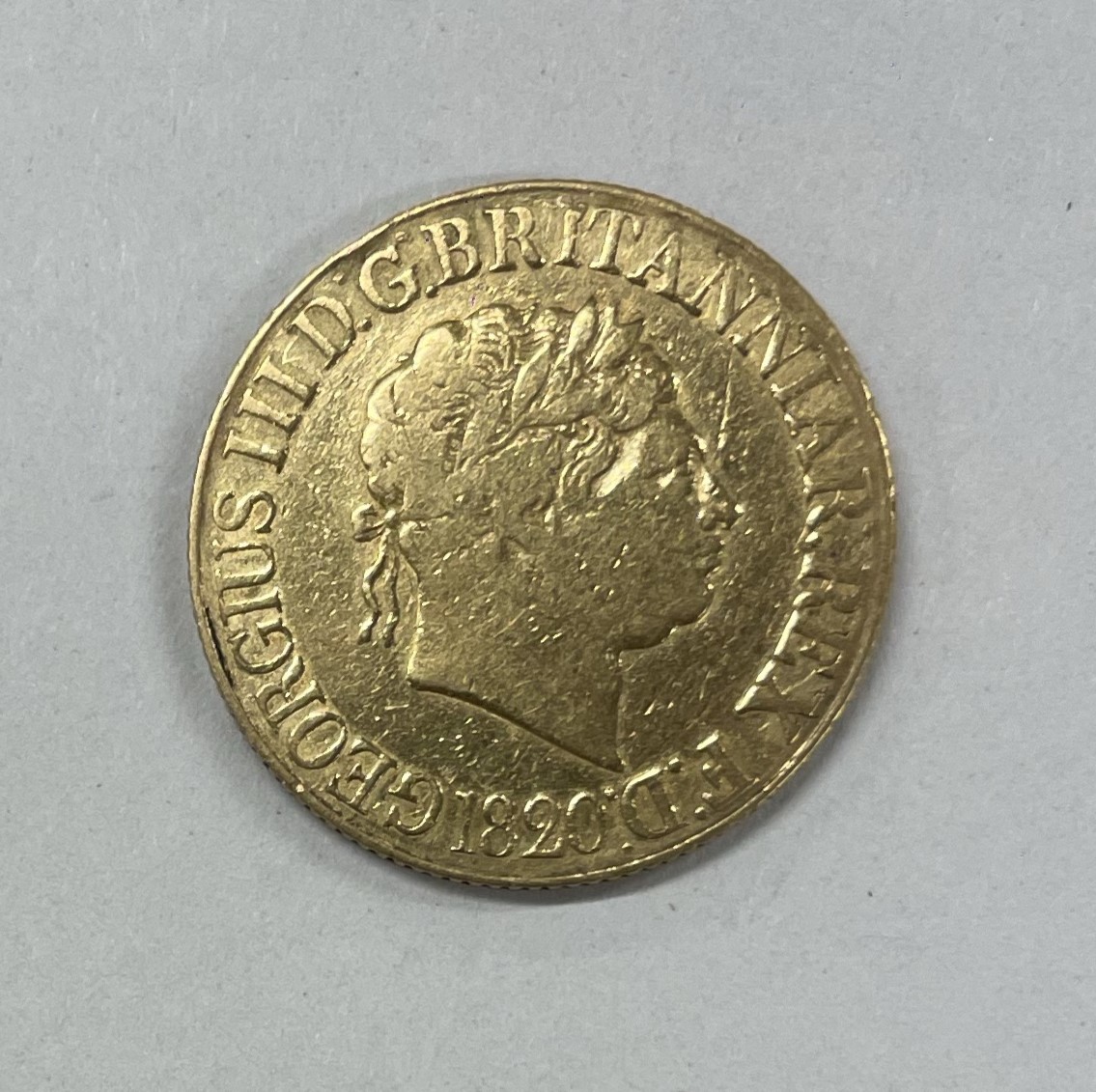 An 1820 George III full Sovereign. - Image 2 of 2