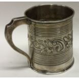 A William IV silver embossed christening mug. London 1834.