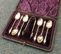 A cased Victorian silver Chinoiserie spoon and sifter set. Sheffield 1896.