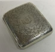 A Victorian silver engraved cigarette case. London 1894. By George Unite.