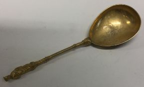 A silver gilt apostle spoon.