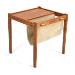 A Danish teak occasional table with fabric magazine holder, paper label for BRDR Furbo, Spottrup, 45