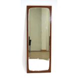 A 1960's Danish mirror, the bevelled glass within a teak frame, stamped 'Made in Denmark' to the