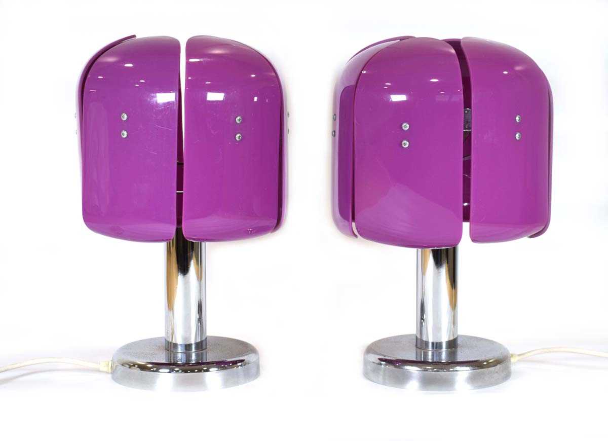 A pair of 1970's table lamps with chromed bodies and purple perspex sectional shades, h. 41 cmFairly