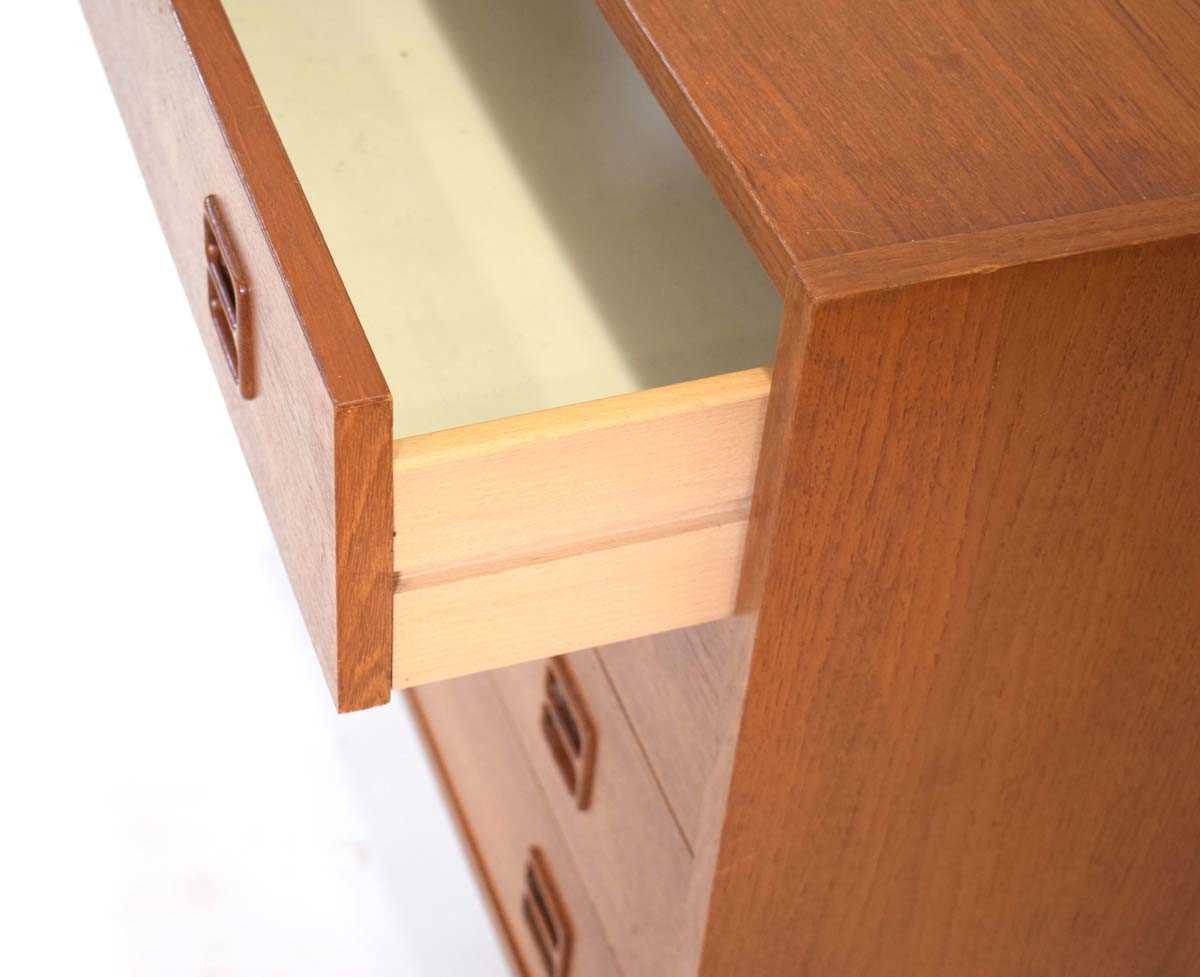 A 1960's Danish teak chest, the four long drawers each with an integral moulded handle, on - Image 6 of 6