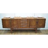 A G-Plan 'Fresco' Range teak and crossbanded sideboard, the four central drawers flanked by two
