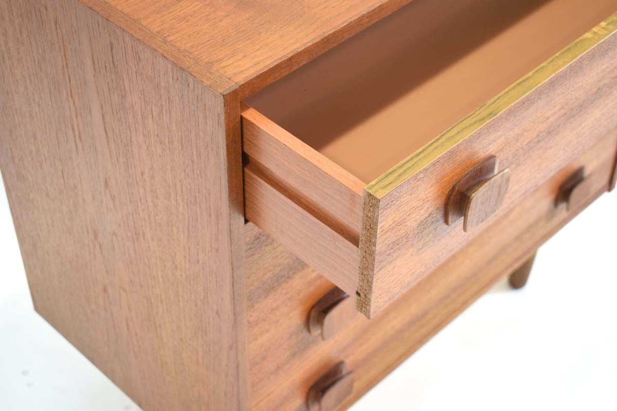 A 1960's Danish teak chest of four drawers with square moulded handles, on later tapering legs, w. - Image 4 of 4