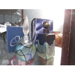Two boxed Okra perfume bottles and stoppers including 'Merlins Web' and 'Alchemy' (2)No chips,