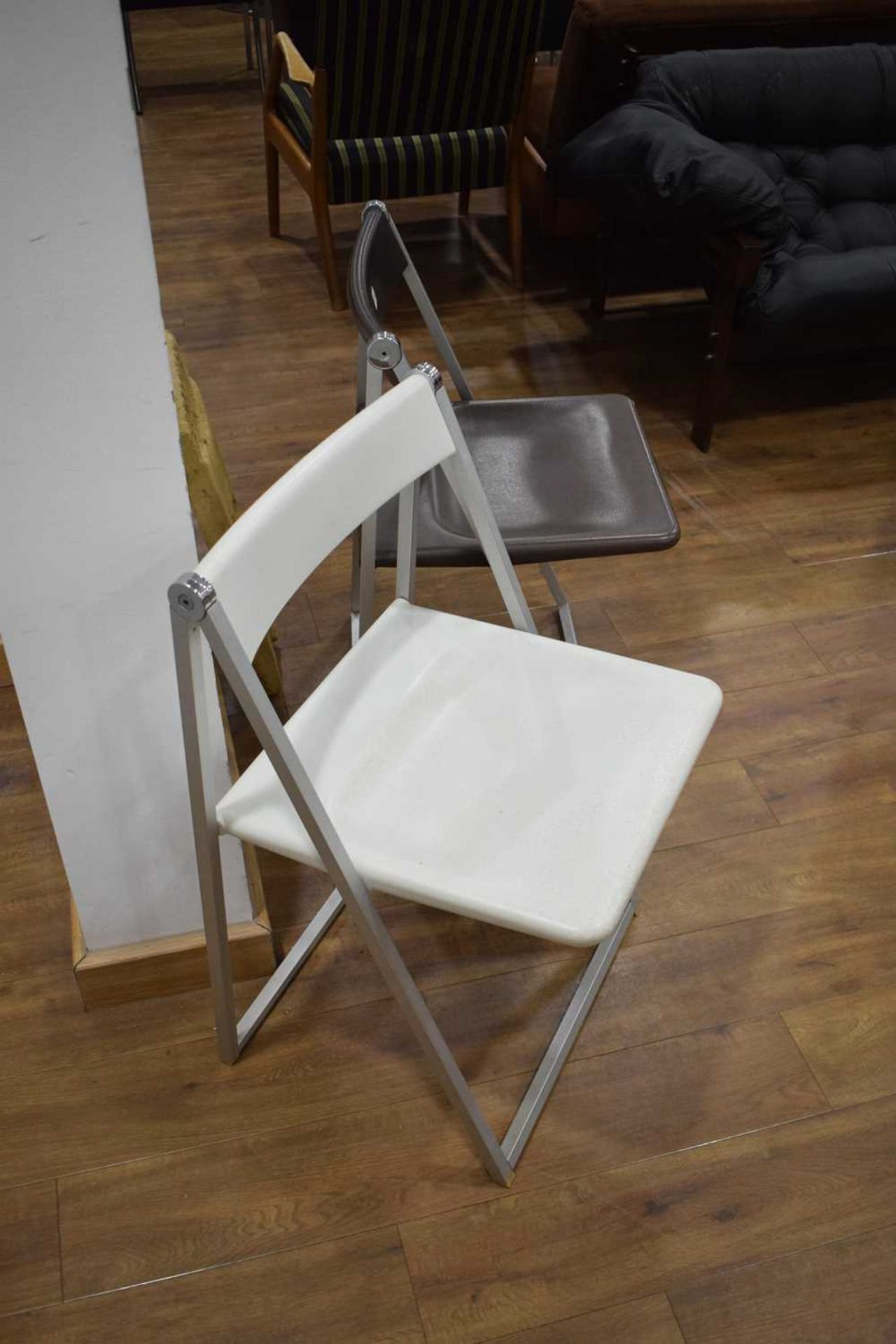 A pair of German folding chairs in brown and white, designed in 1971 by Team Form AG, manufactured - Image 4 of 9