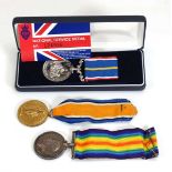 A pair of First World War medals awarded to 29781 Pte E. Eaton Bedf R. together with a cased