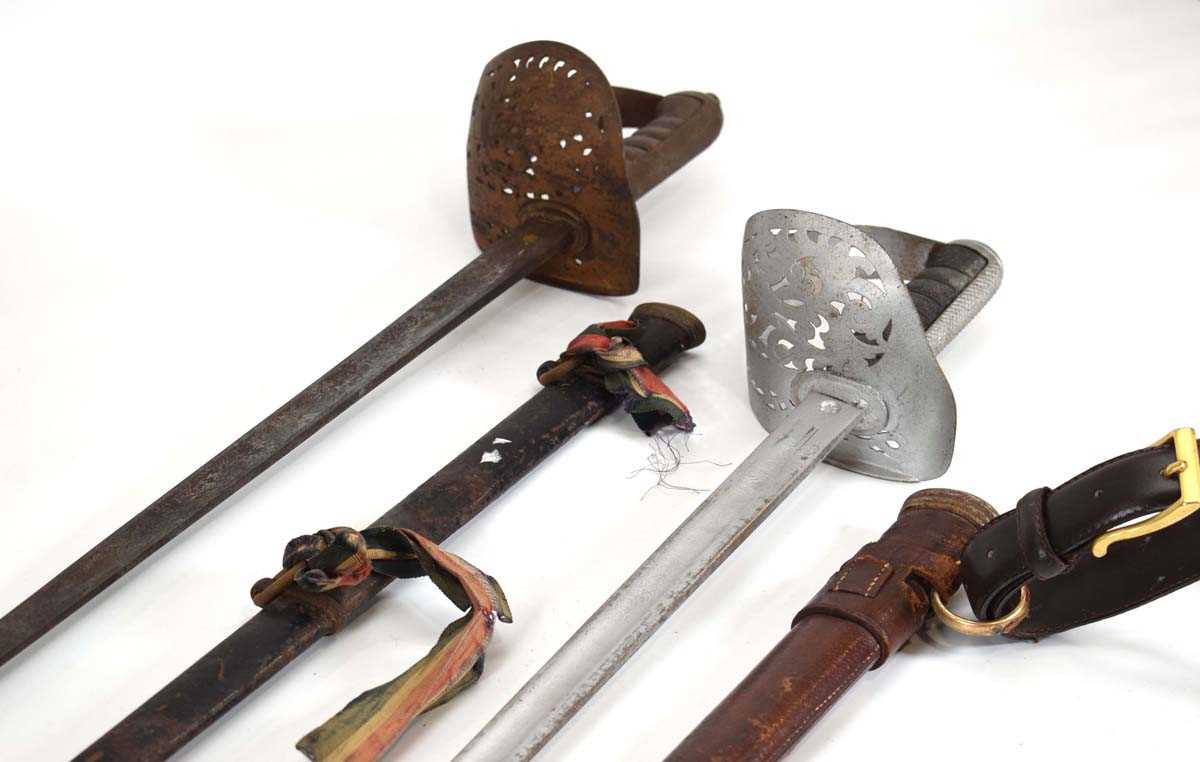 An 1822-pattern cavalry officer's sword and scabbard together with another example (2)Both worn